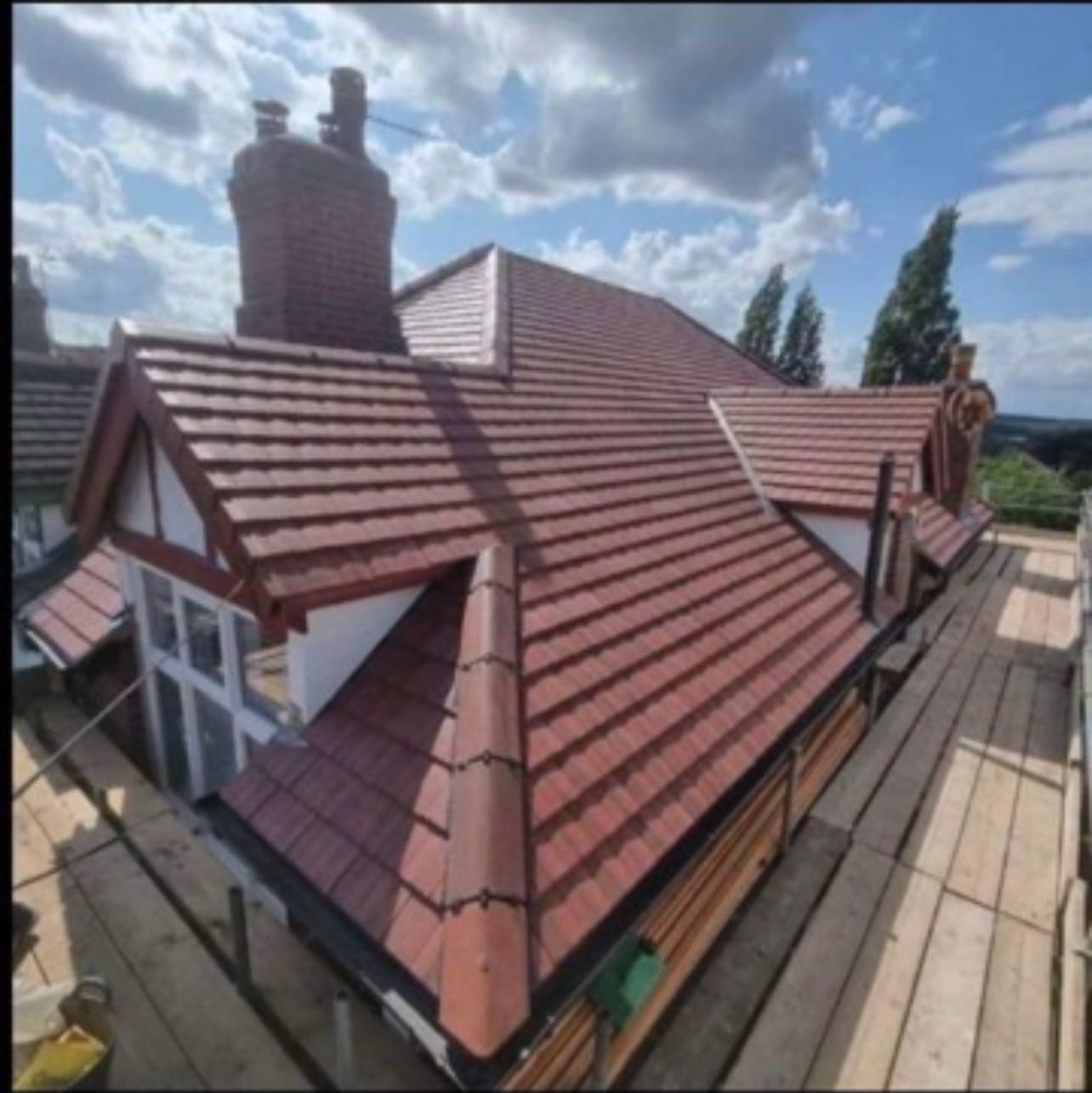 New red tiled roof with dormer fitted by Weatherpro